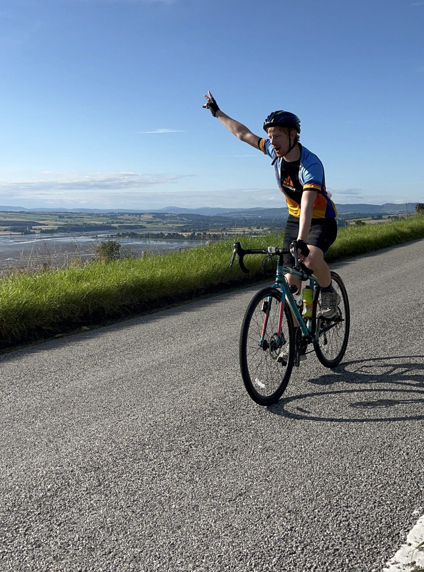 NC500 rider giving peace sign