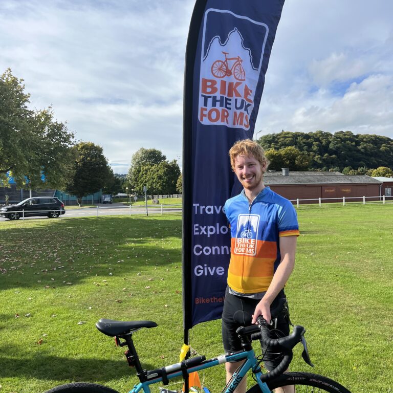 NC500 rider with flag